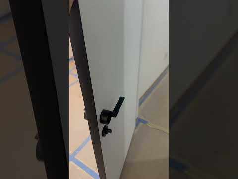 Modern Hidden Door with Black Frame & Magnetic Lock | Planum 0010 by UnitedPorte