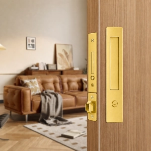Pocket door lock with a hidden handle design - Gold